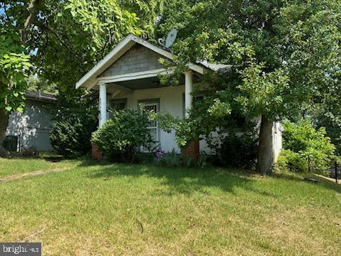 exterior space with a front lawn