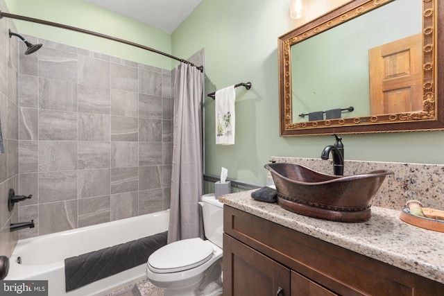 full bathroom with vanity, toilet, and shower / bathtub combination with curtain