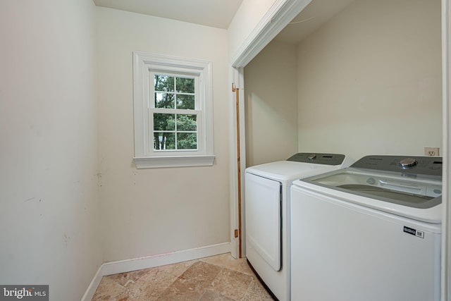 laundry room with washer and dryer