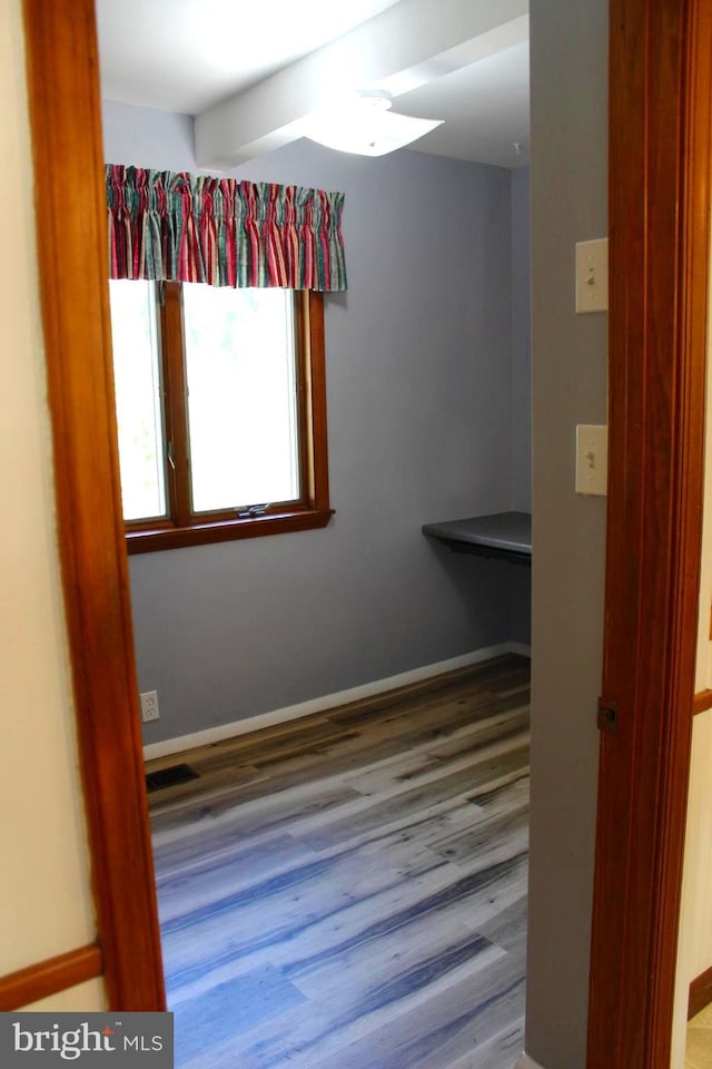 empty room featuring hardwood / wood-style floors