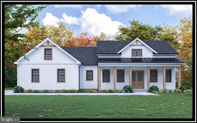 modern farmhouse with a porch and a front lawn