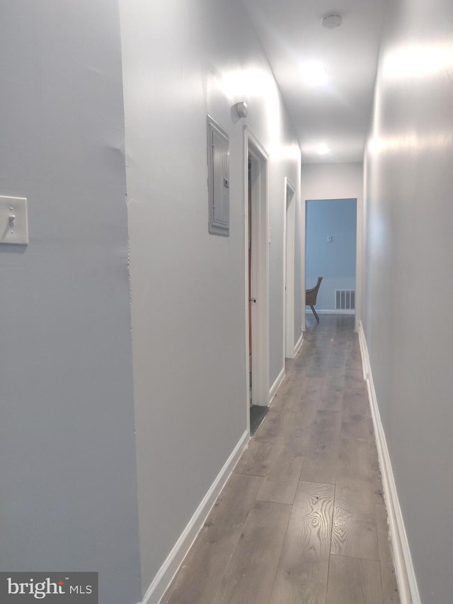 hallway with electric panel