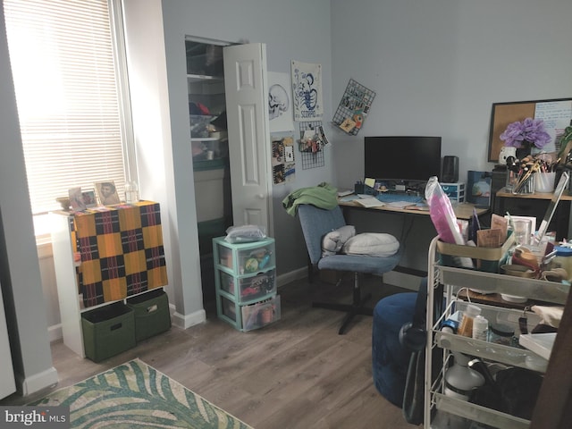 office area with hardwood / wood-style flooring