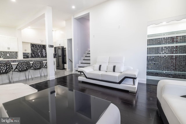 living room featuring dark hardwood / wood-style floors