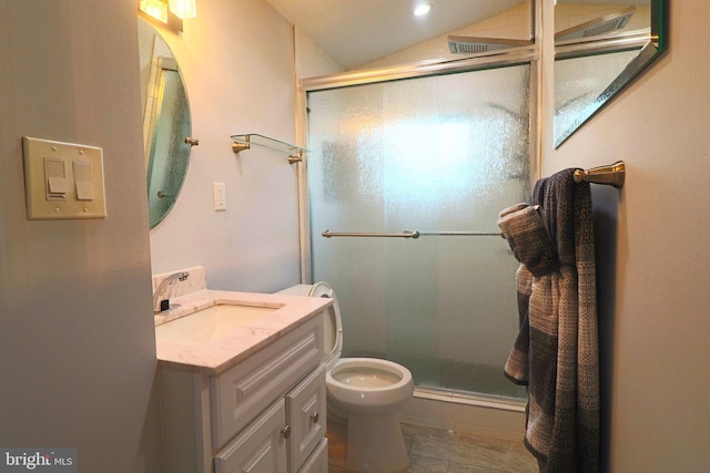 bathroom with toilet, a shower with door, and vanity