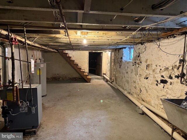 1717 W 4th St, Wilmington, DE 19805 - below grade area featuring gas water heater, stairs, and a heating unit
