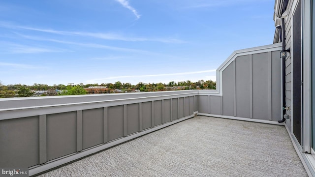 balcony featuring a baseboard heating unit