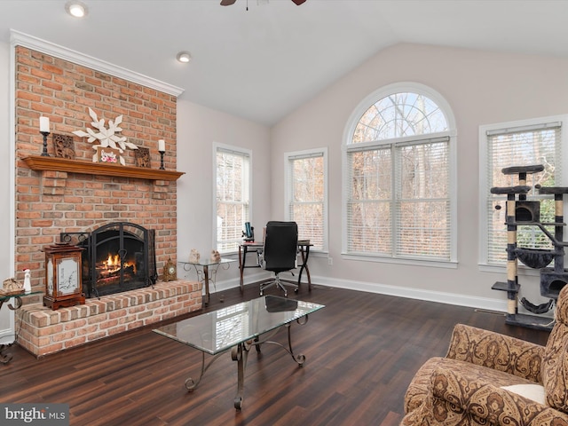 living room with a fireplace, a wealth of natural light, dark hardwood / wood-style flooring, and ceiling fan