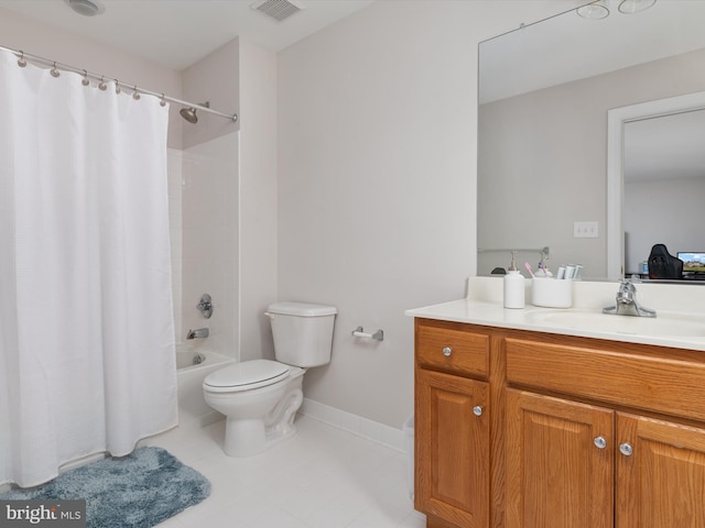 full bathroom featuring tile patterned floors, shower / tub combo with curtain, vanity, and toilet