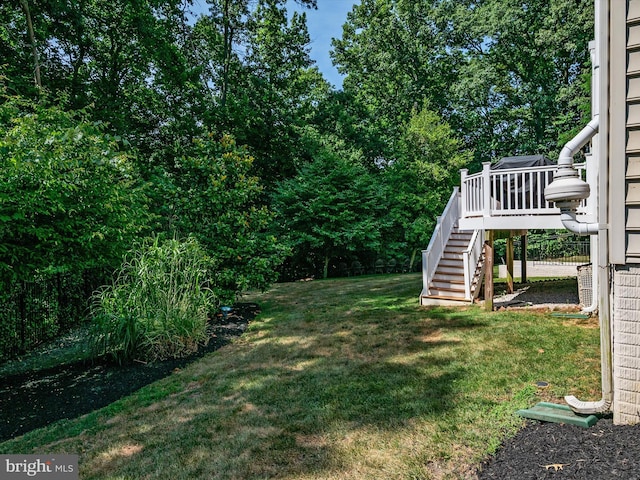 view of yard featuring a deck