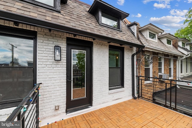 doorway to property with a balcony