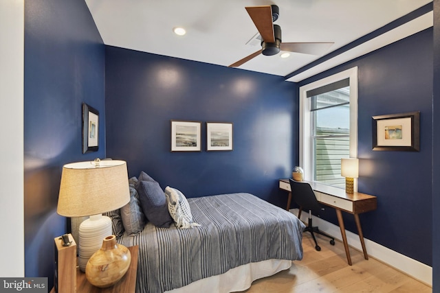 bedroom featuring ceiling fan and wood-type flooring