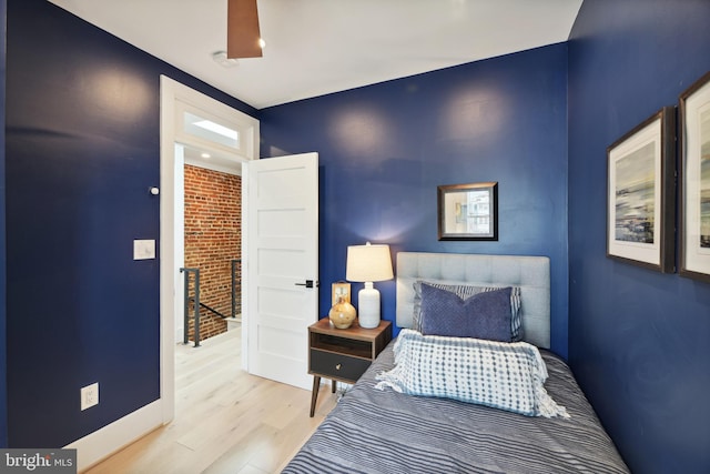 bedroom with light hardwood / wood-style floors