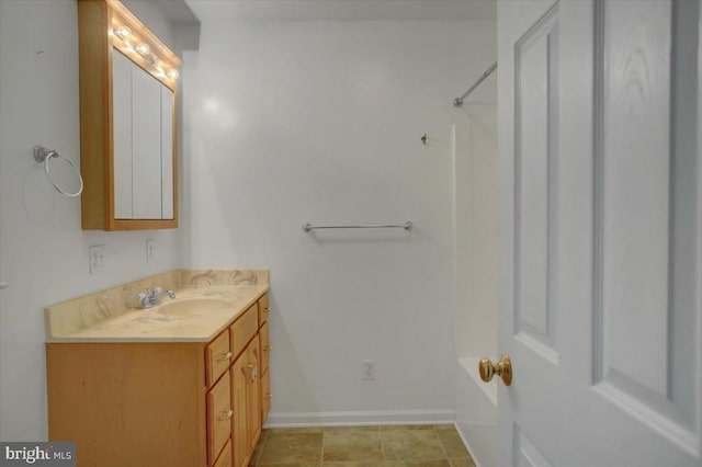 bathroom with vanity and walk in shower