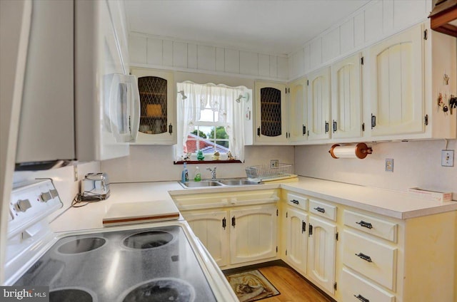 kitchen featuring stove and sink