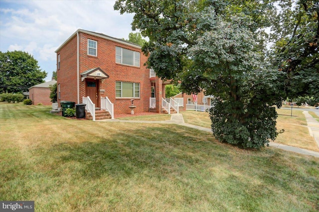 view of front of property with a front lawn