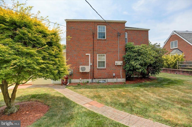 view of home's exterior featuring a lawn