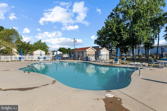 view of swimming pool featuring a patio