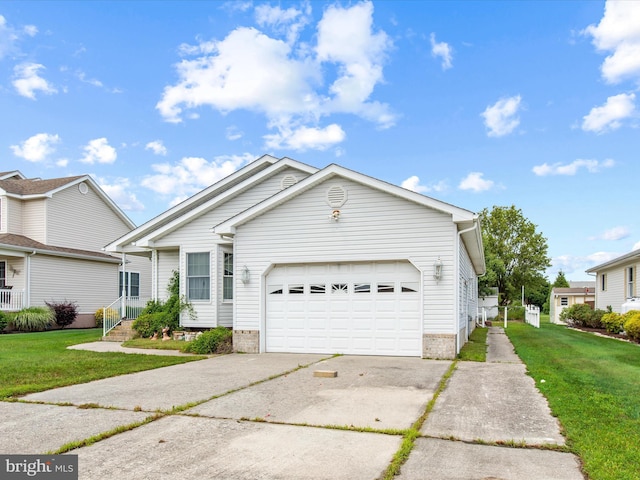 view of front of house featuring a garage and a front yard