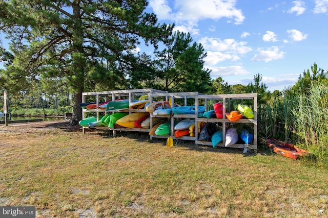 view of jungle gym with a lawn