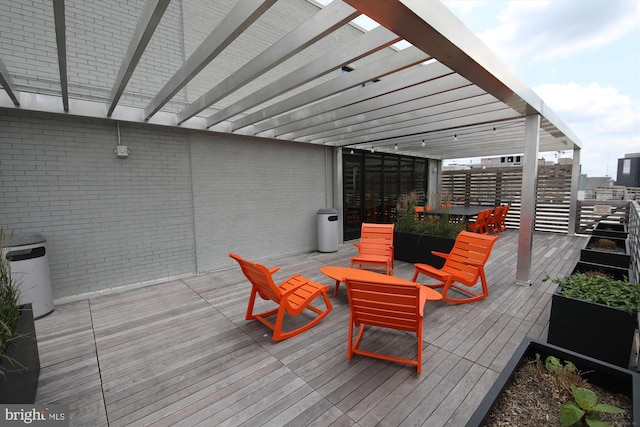 wooden terrace featuring a pergola