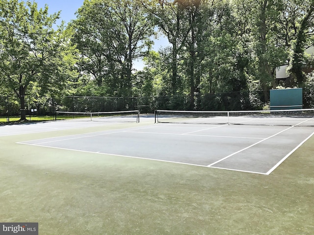 view of tennis court with basketball court