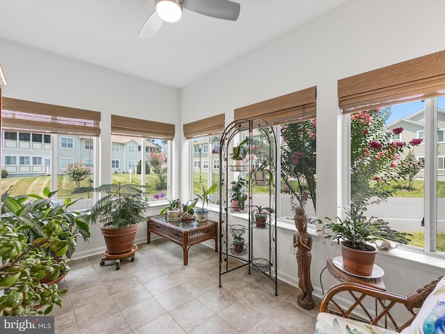 sunroom / solarium with ceiling fan