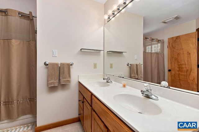 bathroom featuring tile patterned floors, vanity, and a shower with shower curtain