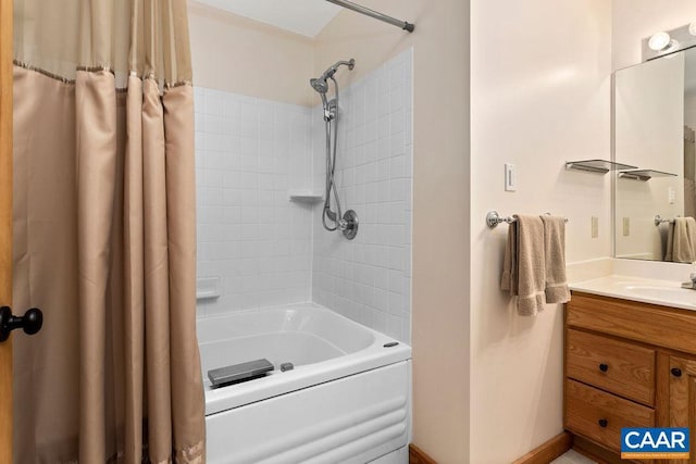 bathroom with vanity and shower / tub combo with curtain