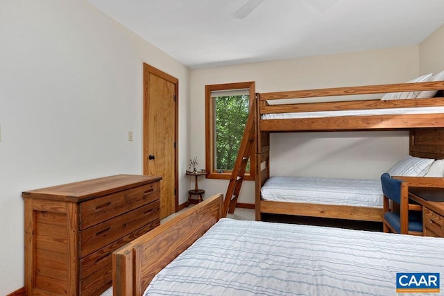 bedroom featuring ceiling fan and carpet floors