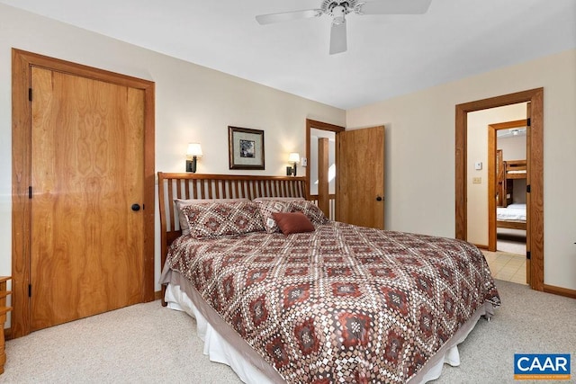 bedroom with light colored carpet and ceiling fan