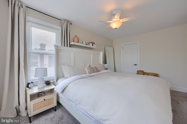 bedroom featuring ceiling fan and carpet floors