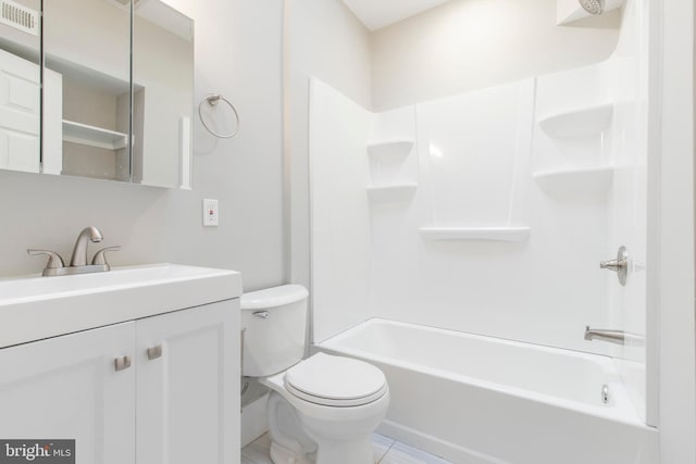 full bathroom featuring tile patterned floors, vanity, tub / shower combination, and toilet