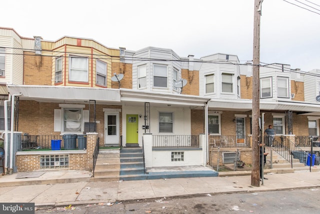 multi unit property featuring covered porch