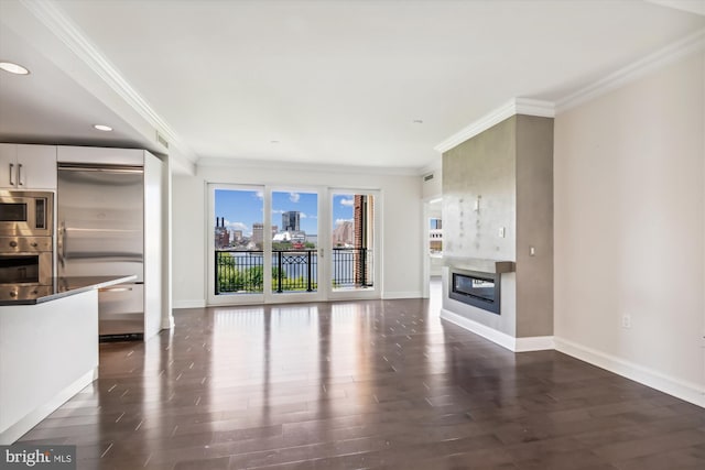 unfurnished living room featuring crown molding and dark wood-type flooring