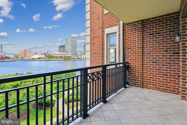 balcony featuring a water view