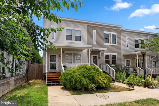 multi unit property featuring covered porch