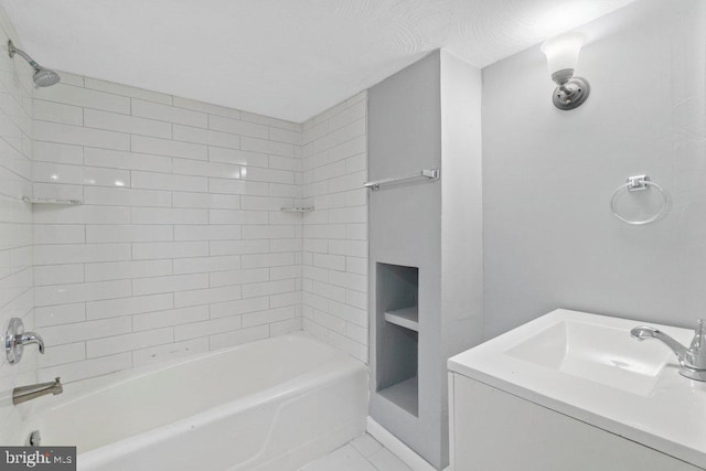 bathroom with tiled shower / bath combo and tile patterned floors