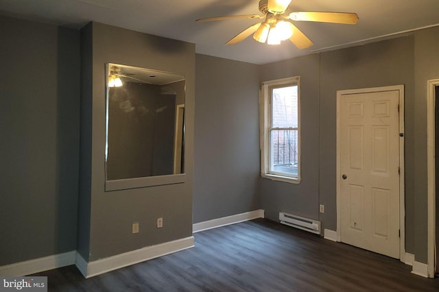 unfurnished bedroom with a baseboard radiator, dark hardwood / wood-style floors, and ceiling fan