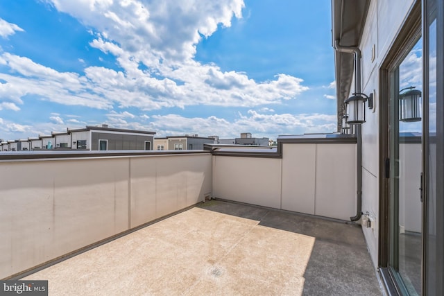 view of patio / terrace with a balcony