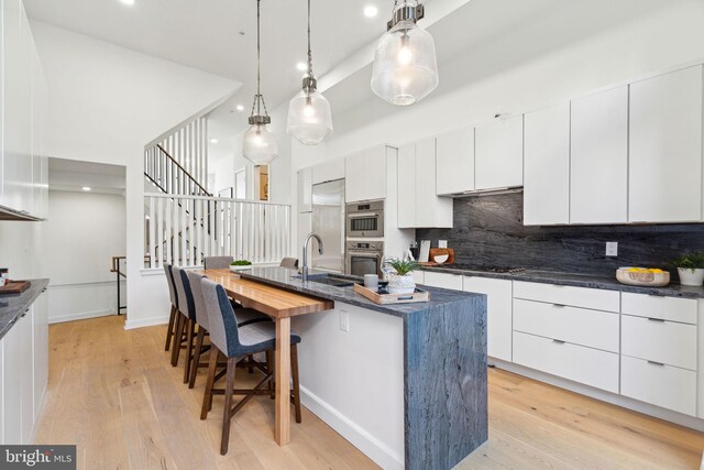 stairway featuring hardwood / wood-style floors