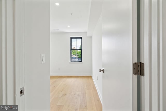 corridor featuring light wood-type flooring