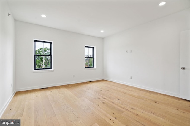 empty room featuring light hardwood / wood-style floors