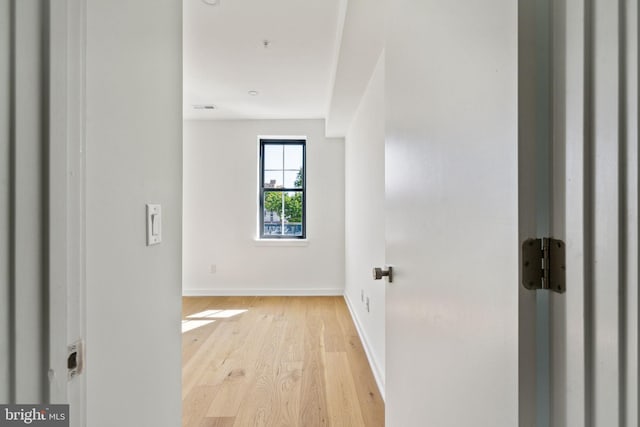 corridor featuring light wood-type flooring