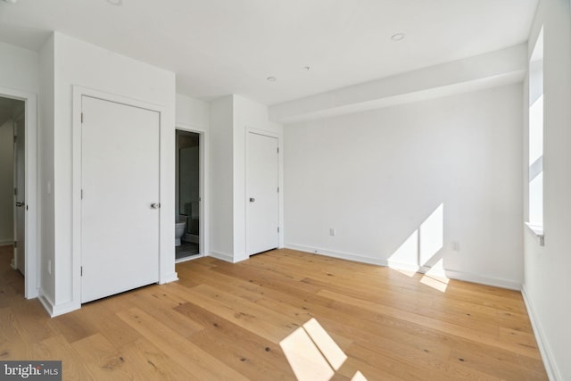 unfurnished bedroom featuring light hardwood / wood-style floors