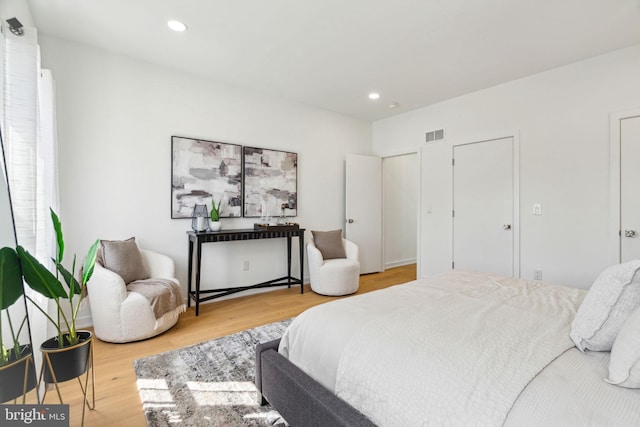 bedroom featuring hardwood / wood-style flooring