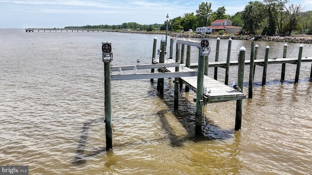 view of dock with a water view