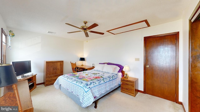 bedroom with light carpet and ceiling fan