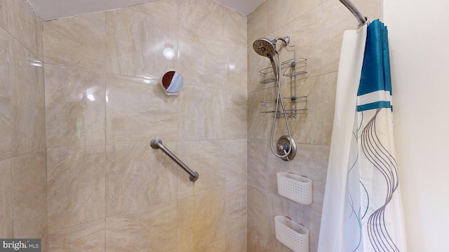 bathroom featuring curtained shower