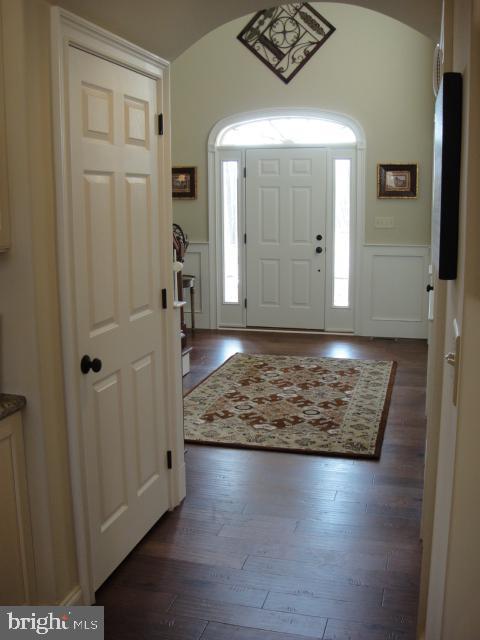 foyer featuring dark hardwood / wood-style flooring